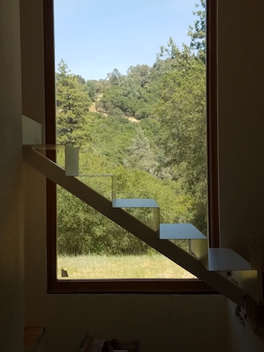 Staircase using a Single Beam Structure looking out window